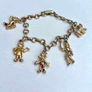 ADORABLE CHILDREN'S GOLD TONE CHARM BRACELET